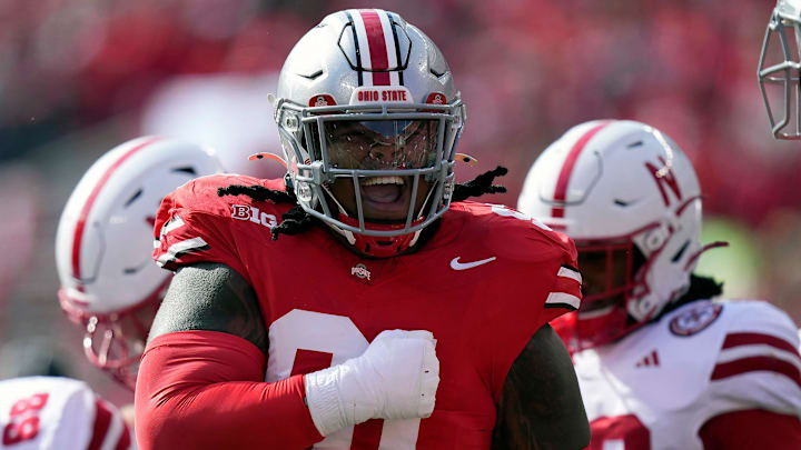 Ohio State Buckeyes defensive tackle Tyleik Williams (91) celebrates the tackle of Nebraska Cornhuskers quarterback Dylan Raiola (15) on a run during the first quarter of their game at Ohio Stadium on Oct 26, 2024, in Columbus.