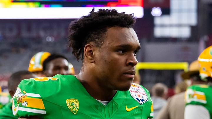 Jan 1, 2024; Glendale, AZ, USA; Oregon Ducks linebacker Devon Jackson (26) against the Liberty Flames during the 2024 Fiesta Bowl at State Farm Stadium. Mandatory Credit: Mark J. Rebilas-USA TODAY Sports Jan 1, 2024; Glendale, AZ, USA; Oregon Ducks linebacker Devon Jackson (26) against the Liberty Flames during the 2024 Fiesta Bowl at State Farm Stadium. Mandatory Credit: Mark J. Rebilas-USA TODAY Sports