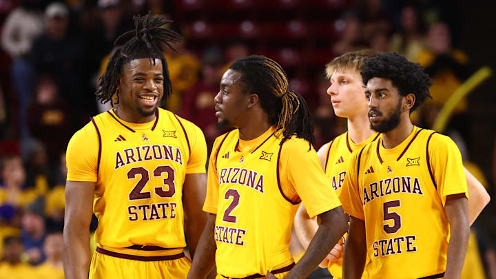 Jan 24, 2026; Tempe, Arizona, USA; Arizona State Sun Devils forward Allen Mukeba (23), guard Anthony Johnson (2) and guard Maurice Odum (5) against the Cincinnati Bearcats at Desert Financial Arena. Mandatory Credit: Mark J. Rebilas-Imagn Images