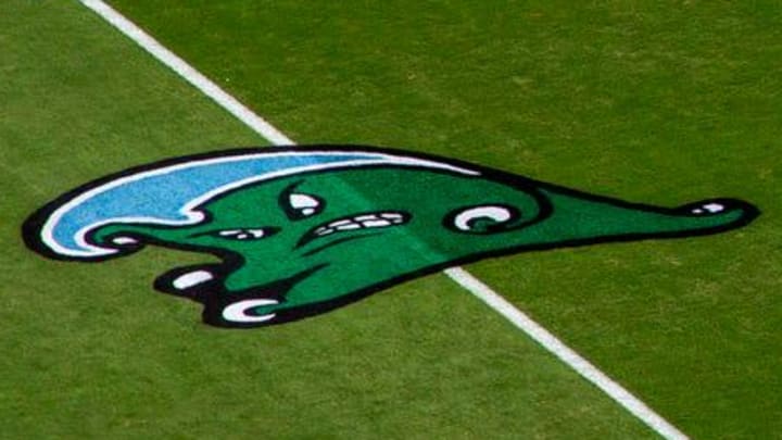 The Tulane Green Wave is painted on the field