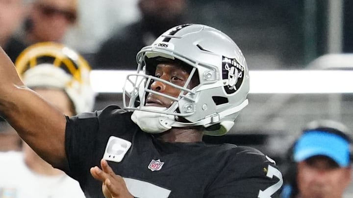 Sep 15, 2025; Paradise, Nevada, USA; Las Vegas Raiders quarterback Geno Smith (7) passes the ball during the fourth quarter against the Los Angeles Chargers at Allegiant Stadium. Mandatory Credit: Stephen R. Sylvanie-Imagn Images