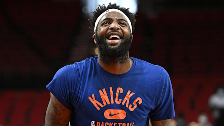 Feb 12, 2022; Portland, Oregon, USA;  New York Knicks center Mitchell Robinson (23) reacts during a light-hearted moment while warming up before a game against the Portland Trail Blazers at Moda Center. Mandatory Credit: Troy Wayrynen-Imagn Images