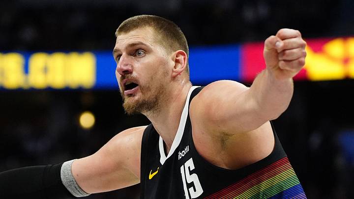 Apr 4, 2026; Denver, Colorado, USA; Denver Nuggets center Nikola Jokic (15) reacts towards a referee against the San Antonio Spurs at Ball Arena. Mandatory Credit: Ron Chenoy-Imagn Images
