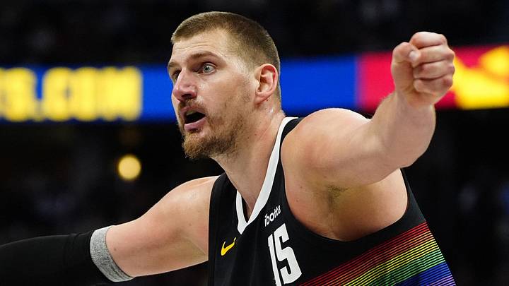Apr 4, 2026; Denver, Colorado, USA; Denver Nuggets center Nikola Jokic (15) reacts towards a referee against the San Antonio Spurs at Ball Arena. Mandatory Credit: Ron Chenoy-Imagn Images