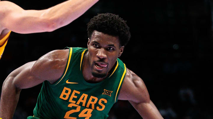 Mar 10, 2026; Kansas City, MO, USA; Baylor Bears guard Tounde Yessoufou (24) drives against Arizona State Sun Devils guard Noah Meeusen (15) during the second half at T-Mobile Center. Mandatory Credit: William Purnell-Imagn Images