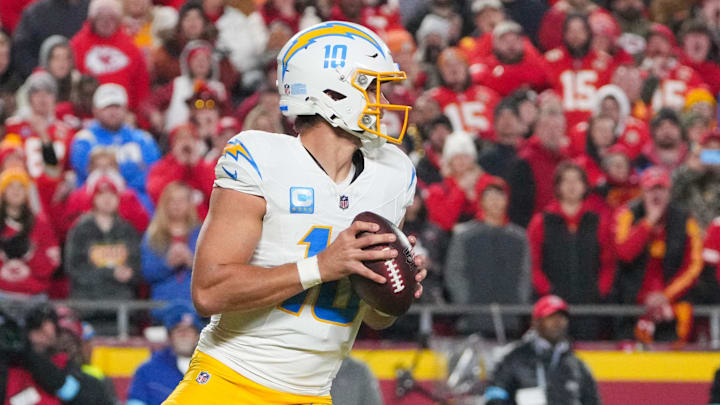 Dec 8, 2024; Kansas City, Missouri, USA; Los Angeles Chargers quarterback Justin Herbert (10) drops back to pass against the Kansas City Chiefs during the first half at GEHA Field at Arrowhead Stadium. Mandatory Credit: Denny Medley-Imagn Images