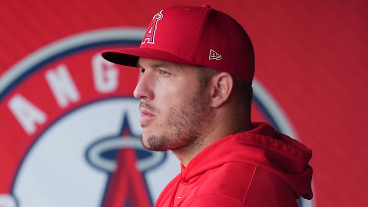 Jul 10, 2024; Anaheim, California, USA; Los Angeles Angels center fielder Mike Trout watches from the dugout during a game against the Texas Rangers at Angel Stadium Jul 10, 2024; Anaheim, California, USA; Los Angeles Angels center fielder Mike Trout watches from the dugout during a game against the Texas Rangers at Angel Stadium