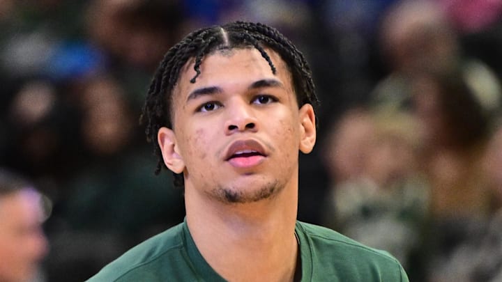 Milwaukee Bucks forward Ousmane Dieng (21) warms up during halftime against the Indiana Pacers at Fiserv Forum. Feb 6, 2026. 