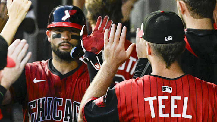 Chicago White Sox rookie Edgar Quero (7) celebrates with fellow catcher Kyle Teel against the Chicago Cubs at Rate Field. 