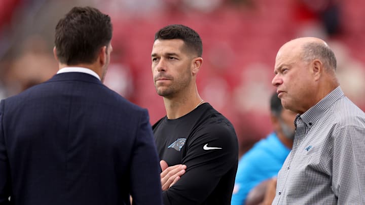 Carolina Panthers head coach Dave Canales, team owner David Tepper, and general manager Dan Morgan