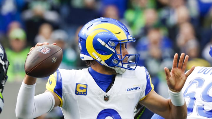 Nov 3, 2024; Seattle, Washington, USA; Los Angeles Rams quarterback Matthew Stafford (9) passes against the Seattle Seahawks during the first quarter at Lumen Field. Mandatory Credit: Joe Nicholson-Imagn Images