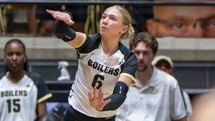 Purdue Redshirt Freshman Sienna Foster (6) serves during an NCAA volleyball match