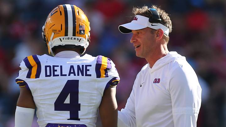 Mississippi Rebels head coach Lane Kiffin talks with LSU Tigers cornerback Mansoor Delane (4) during the second quarter at Vaught-Hemingway Stadium. Mississippi Rebels head coach Lane Kiffin talks with LSU Tigers cornerback Mansoor Delane (4) during the second quarter at Vaught-Hemingway Stadium.