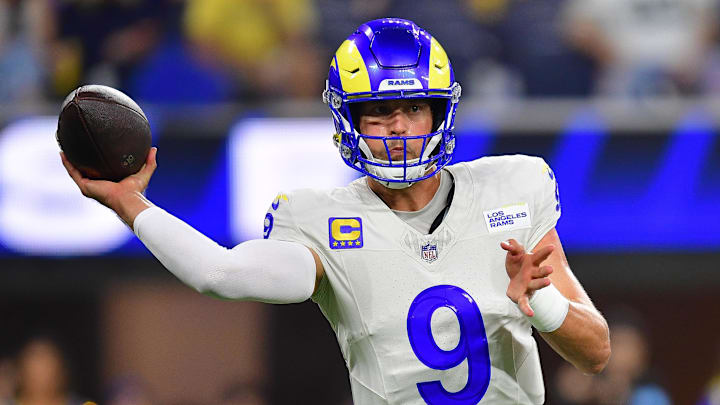 Oct 24, 2024; Inglewood, California, USA; Los Angeles Rams quarterback Matthew Stafford (9) throws against the Minnesota Vikings during the first half at SoFi Stadium. Mandatory Credit: Gary A. Vasquez-Imagn Images