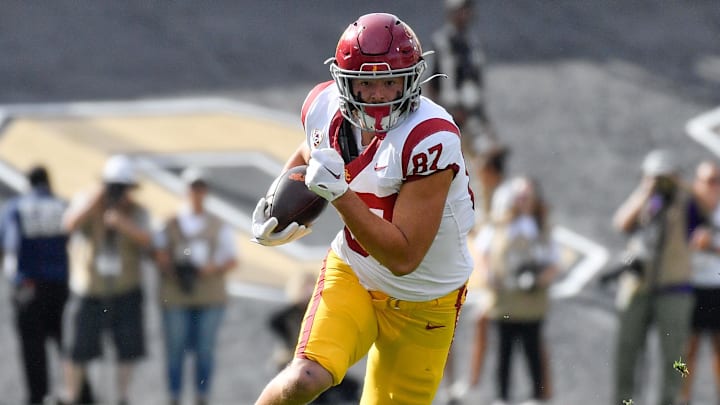 USC Trojans football player Lake McRee was on the receiving end of a tough hit in last week's loss to Michigan.