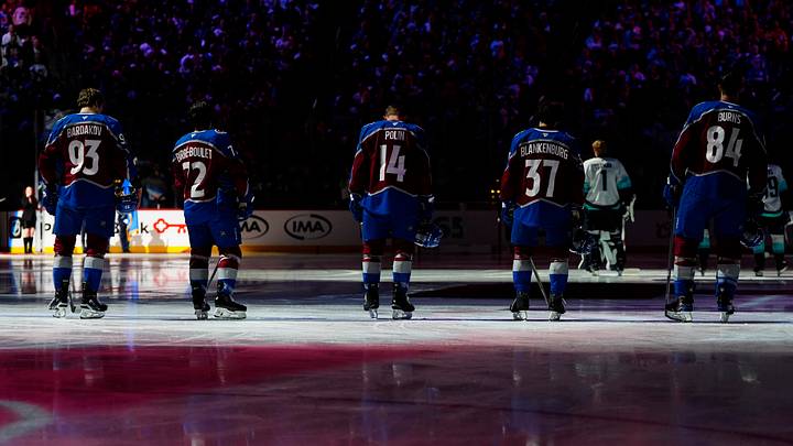 Members of the Colorado Avalanche before the start of the game against the Seattle Kraken at Ball Arena. Members of the Colorado Avalanche before the start of the game against the Seattle Kraken at Ball Arena.
