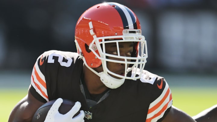 Sep 8, 2024; Cleveland, Ohio, USA; Cleveland Browns wide receiver Amari Cooper (2) runs with the ball after a catch as Dallas Cowboys cornerback Caelen Carson (21) defends during the first quarter at Huntington Bank Field. Mandatory Credit: Ken Blaze-Imagn Images