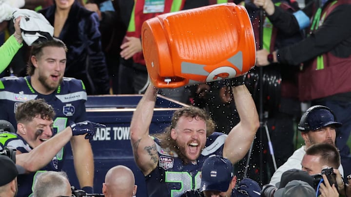[US, Mexico & Canada customers only]  Feb 8, 2026; Santa Clara, CA, USA;  Seattle Seahawks head coach Mike MacDonald is dunked with Gatorade by Brady Russell after defeating the New England Patriots in Super Bowl LX at Levi's Stadium. Mandatory Credit: Carlos Barria/Reuters via Imagn Images