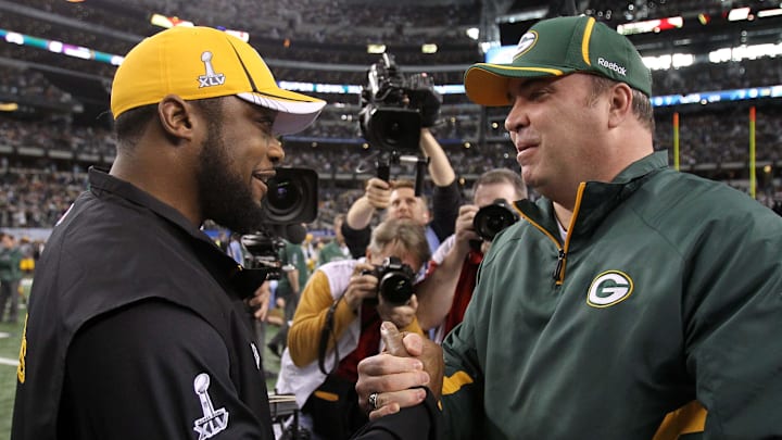 Feb 6, 2011; Arlington, TX, USA; Green Bay Packers head coach Mike McCarthy (right) greets Pittsburgh Steelers head coach Mike Tomlin before Super Bowl XLV at Cowboys Stadium.  Mandatory Credit: Matthew Emmons-Imagn Images