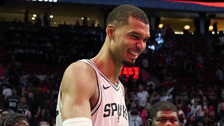 Apr 26, 2026; Portland, Oregon, USA; San Antonio Spurs forward Victor Wembanyama (1) celebrates with teammates after a game against the Portland Trail Blazers during game four of the first round of the 2026 NBA Playoffs at Moda Center. Mandatory Credit: Troy Wayrynen-Imagn Images