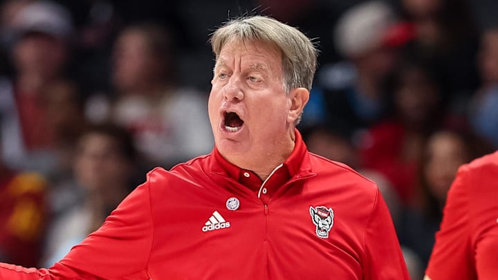 Nov 9, 2025; Charlotte, North Carolina, USA; NC State Wolfpack head coach Wes Moore in action against the Southern California Trojans during the fourth quarter of the Ally Tipoff game at Spectrum Center. Mandatory Credit: Cory Knowlton-Imagn Images Nov 9, 2025; Charlotte, North Carolina, USA; NC State Wolfpack head coach Wes Moore in action against the Southern California Trojans during the fourth quarter of the Ally Tipoff game at Spectrum Center. Mandatory Credit: Cory Knowlton-Imagn Images