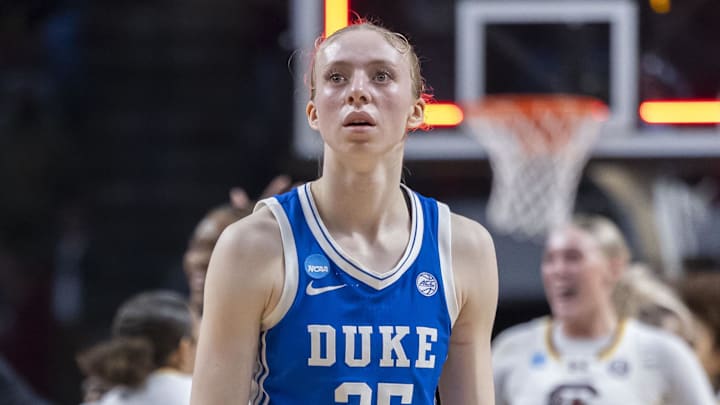 Mar 30, 2025; Birmingham, AL, USA; Duke Blue Devils forward Toby Fournier (35) looks into the distance as she walks off the floor after the South Carolina Gamecocks defeated the Duke Blue Devils at an Elite 8 NCAA Tournament basketball game at Legacy Arena. Mandatory Credit: Vasha Hunt-Imagn Images Mar 30, 2025; Birmingham, AL, USA; Duke Blue Devils forward Toby Fournier (35) looks into the distance as she walks off the floor after the South Carolina Gamecocks defeated the Duke Blue Devils at an Elite 8 NCAA Tournament basketball game at Legacy Arena. Mandatory Credit: Vasha Hunt-Imagn Images