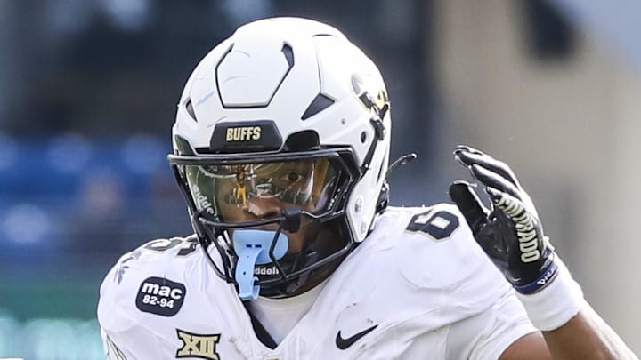 Nov 8, 2025; Morgantown, West Virginia, USA; Colorado Buffaloes wide receiver Dre'Lon Miller (6) runs the ball during the second quarter against the West Virginia Mountaineers at Milan Puskar Stadium. Mandatory Credit: Ben Queen-Imagn Images