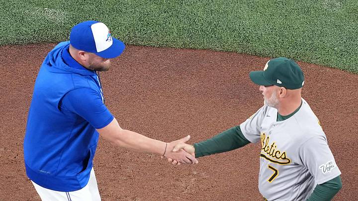 Mar 27, 2026; Toronto, Ontario, CAN; Toronto Blue Jays manager John Schneider (14) shakes hands with Athletics manager Mark Kotsay (7) before a game at Rogers Centre. Mandatory Credit: Nick Turchiaro-Imagn Images Mar 27, 2026; Toronto, Ontario, CAN; Toronto Blue Jays manager John Schneider (14) shakes hands with Athletics manager Mark Kotsay (7) before a game at Rogers Centre. Mandatory Credit: Nick Turchiaro-Imagn Images