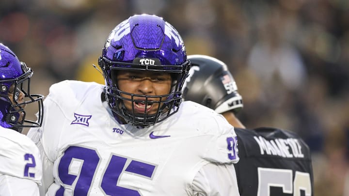 Texas Christian University Horned Frogs defensive lineman Markis Deal (95) celebrates after a defensive stop during the first quarter against the West Virginia Mountaineers at Milan Puskar Stadium. Texas Christian University Horned Frogs defensive lineman Markis Deal (95) celebrates after a defensive stop during the first quarter against the West Virginia Mountaineers at Milan Puskar Stadium.