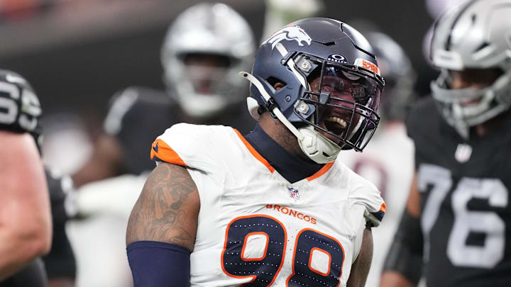 Dec 7, 2025; Paradise, Nevada, USA;  Denver Broncos defensive end John Franklin-Myers (98) reacts after a sack against the Las Vegas Raiders during the first half at Allegiant Stadium. Mandatory Credit: Kirby Lee-Imagn Images