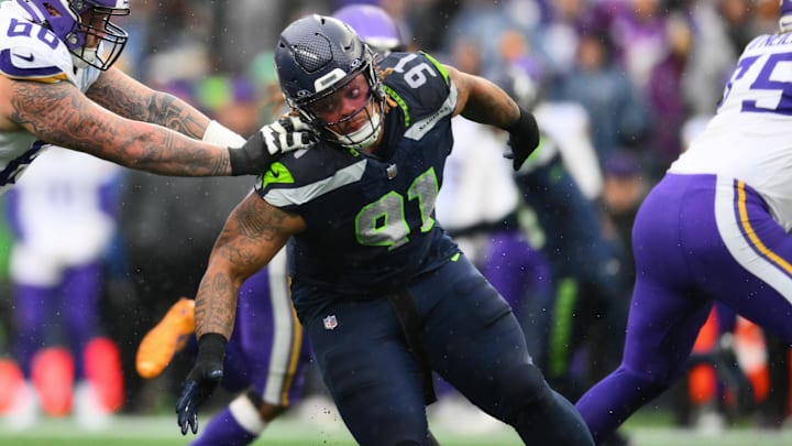 Dec 22, 2024; Seattle, Washington, USA; Minnesota Vikings guard Dalton Risner (66) blocks Seattle Seahawks defensive tackle Byron Murphy II (91) during the first half at Lumen Field