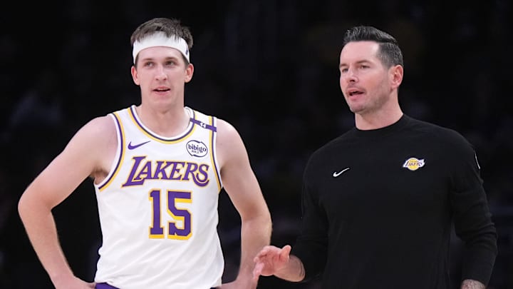 Dec 15, 2024; Los Angeles, California, USA; Los Angeles Lakers coach JJ Redick (right) talks with guard Austin Reaves (15) in the first half at Crypto.com Arena. Mandatory Credit: Kirby Lee-Imagn Images Dec 15, 2024; Los Angeles, California, USA; Los Angeles Lakers coach JJ Redick (right) talks with guard Austin Reaves (15) in the first half at Crypto.com Arena. Mandatory Credit: Kirby Lee-Imagn Images