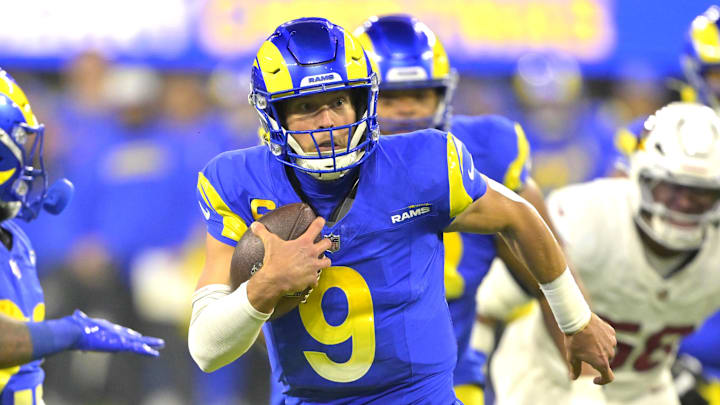 Dec 28, 2024; Inglewood, California, USA; Los Angeles Rams quarterback Matthew Stafford (9) carries the ball to the 5-yard line in the first half against the Arizona Cardinals at SoFi Stadium. Mandatory Credit: Jayne Kamin-Oncea-Imagn Images Dec 28, 2024; Inglewood, California, USA; Los Angeles Rams quarterback Matthew Stafford (9) carries the ball to the 5-yard line in the first half against the Arizona Cardinals at SoFi Stadium. Mandatory Credit: Jayne Kamin-Oncea-Imagn Images