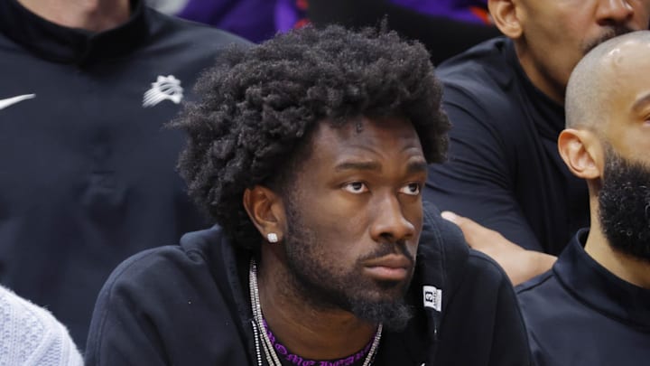 Mar 17, 2026; Minneapolis, Minnesota, USA; Phoenix Suns guard Jalen Green (4) and center Mark Williams (15) watch as their team plays the Minnesota Timberwolves in the fourth quarter at Target Center. Mandatory Credit: Bruce Kluckhohn-Imagn Images
