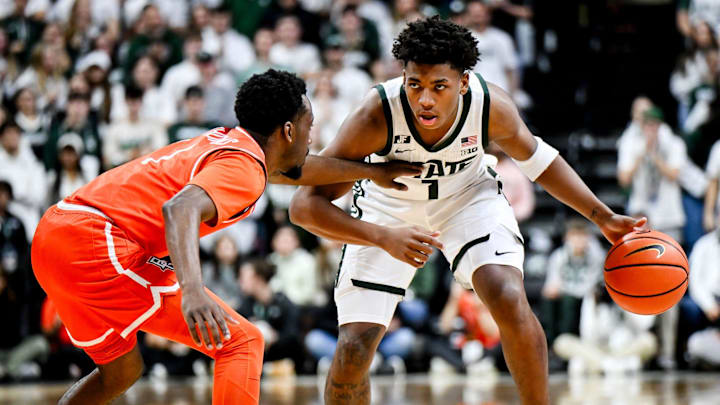 Michigan State's Jeremy Fears Jr., right, moves the ball against Bowling Green's Trey Thomas during the first half on Saturday, Nov. 16, 2024, Breslin Center in East Lansing. Michigan State's Jeremy Fears Jr., right, moves the ball against Bowling Green's Trey Thomas during the first half on Saturday, Nov. 16, 2024, Breslin Center in East Lansing.