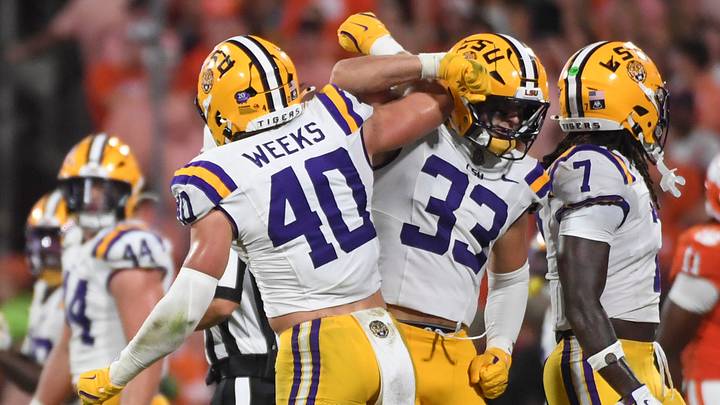 Whit Weeks and West Weeks celebrate after a defensive stop against Clemson in 2025