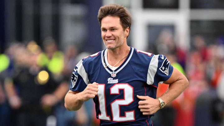Sep 10, 2023; Foxborough, Massachusetts, USA; New England Patriots former quarterback Tom Brady runs on the field during a halftime ceremony in his honor during the game between the Philadelphia Eagles and New England Patriots at Gillette Stadium. Mandatory Credit: Brian Fluharty-USA TODAY Sports Sep 10, 2023; Foxborough, Massachusetts, USA; New England Patriots former quarterback Tom Brady runs on the field during a halftime ceremony in his honor during the game between the Philadelphia Eagles and New England Patriots at Gillette Stadium. Mandatory Credit: Brian Fluharty-USA TODAY Sports