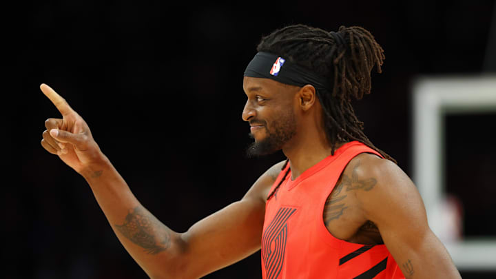 Feb 22, 2026; Phoenix, Arizona, USA; Portland Trail Blazers forward Jerami Grant (9) against the Phoenix Suns at Mortgage Matchup Center. Mandatory Credit: Mark J. Rebilas-Imagn Images