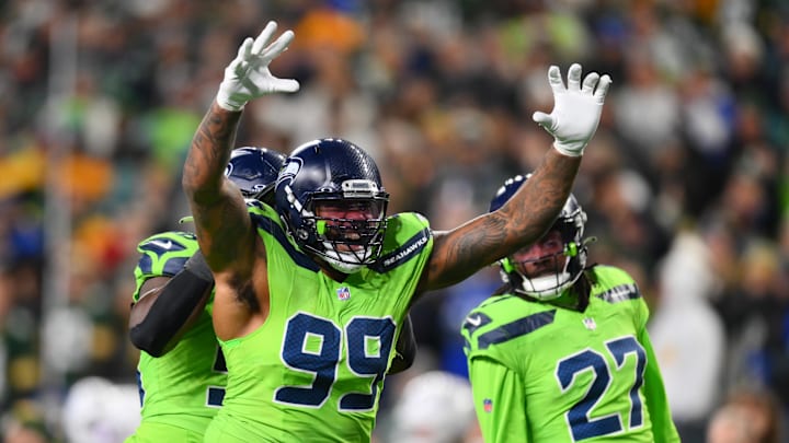 Dec 15, 2024; Seattle, Washington, USA; Seattle Seahawks defensive end Leonard Williams (99) celebrates after a defensive play against the Green Bay Packers during the second half at Lumen Field. Dec 15, 2024; Seattle, Washington, USA; Seattle Seahawks defensive end Leonard Williams (99) celebrates after a defensive play against the Green Bay Packers during the second half at Lumen Field.