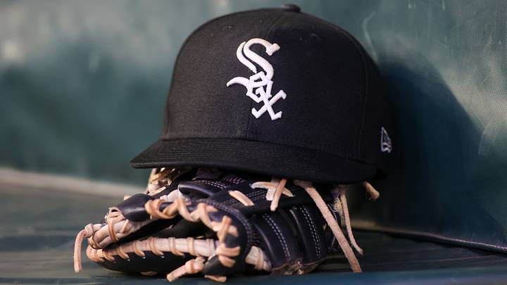 Jul 14, 2023; Atlanta, Georgia, USA; A detailed view of a Chicago White Sox hat and glove in the dugout against the Atlanta Braves in the fourth inning at Truist Park. Mandatory Credit: Brett Davis-USA TODAY Sports Jul 14, 2023; Atlanta, Georgia, USA; A detailed view of a Chicago White Sox hat and glove in the dugout against the Atlanta Braves in the fourth inning at Truist Park. Mandatory Credit: Brett Davis-USA TODAY Sports