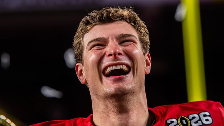 Indiana's Fernando Mendoza (15) smiles on the podium after the College Football Playoff National Championship college football game at Hard Rock Stadium in Miami Gardens on Monday, Jan. 19, 2026. Indiana's Fernando Mendoza (15) smiles on the podium after the College Football Playoff National Championship college football game at Hard Rock Stadium in Miami Gardens on Monday, Jan. 19, 2026.