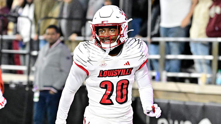 Oct 25, 2024; Chestnut Hill, Massachusetts, USA; Louisville Cardinals defensive back Tayon Holloway (20) reacts to his defensive play against the Boston College Eagles during the second half at Alumni Stadium.