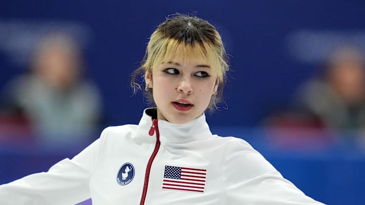 Alysa Liu of the United States warms up before competing.