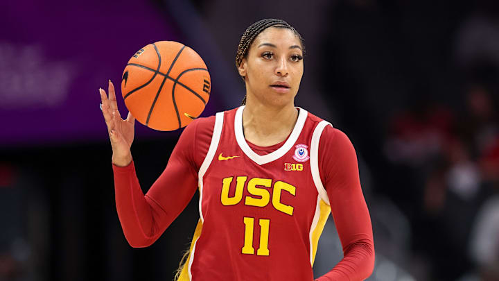 Nov 9, 2025; Charlotte, North Carolina, USA; Southern California Trojans guard Kennedy Smith (11) brings the ball down court against the NC State Wolfpack during the third quarter of the Ally Tipoff game at Spectrum Center. Mandatory Credit: Cory Knowlton-Imagn Images