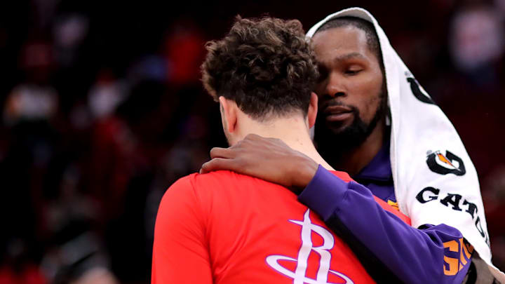 Dec 27, 2023; Houston, Texas, USA; Phoenix Suns forward Kevin Durant (35) greets Houston Rockets center Alperen Sengun (28) following the game at Toyota Center. Mandatory Credit: Erik Williams-Imagn Images