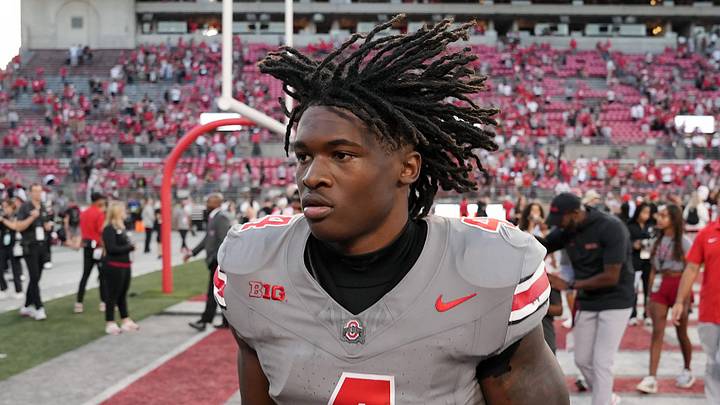 Oct 5, 2024; Columbus, OH, USA; Ohio State Buckeyes wide receiver Jeremiah Smith (4) runs off the field after beating Iowa Hawkeyes after the NCAA football game at Ohio Stadium. Oct 5, 2024; Columbus, OH, USA; Ohio State Buckeyes wide receiver Jeremiah Smith (4) runs off the field after beating Iowa Hawkeyes after the NCAA football game at Ohio Stadium.