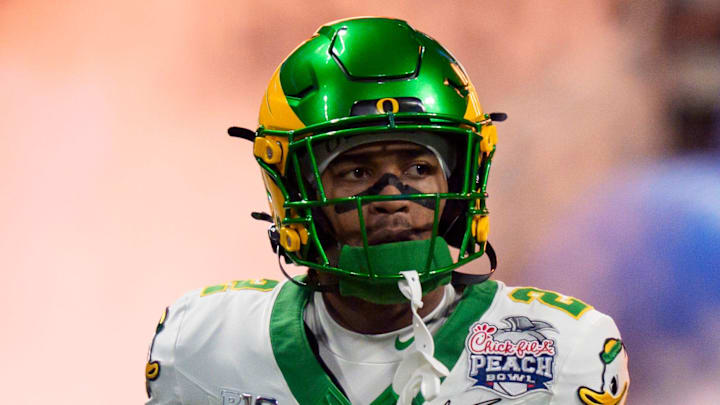 Oregon wide receiver Gary Bryant Jr. runs out onto the field as the Oregon Ducks face the Indiana Hoosiers in the Peach Bowl on Jan. 9, 2026, at Mercedes-Benz Stadium in Atlanta, Georgia.