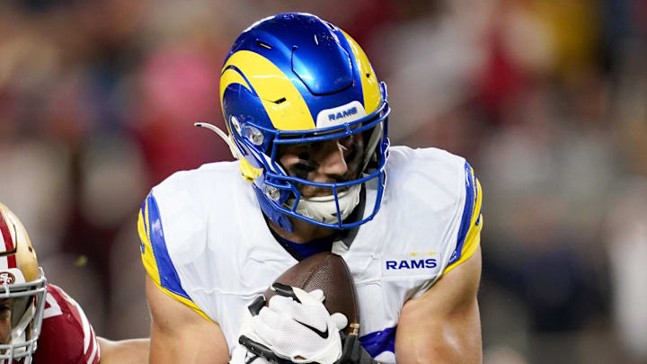 Dec 12, 2024; Santa Clara, California, USA; Los Angeles Rams tight end Colby Parkinson (86) makes a catch for a first down in front of San Francisco 49ers safety Talanoa Hufanga (29) in the fourth quarter at Levi's Stadium. Mandatory Credit: Cary Edmondson-Imagn Images