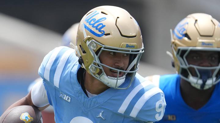 May 2, 2026; Pasadena, CA, USA; UCLA Bruins quarterback Nico Iamaleava (9) carries the ball during the spring game at Rose Bowl. Mandatory Credit: Kirby Lee-Imagn Images