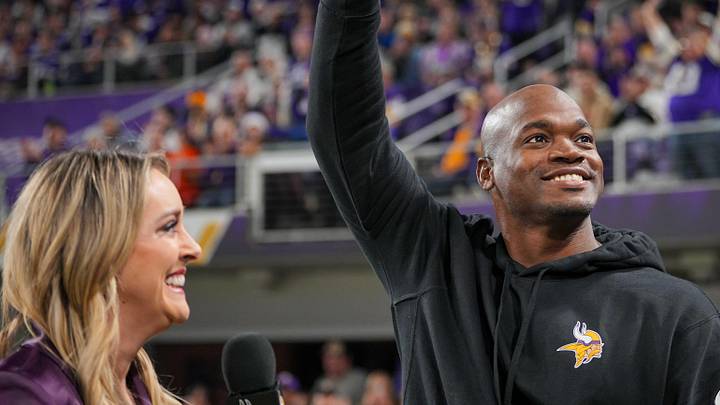 Nov 27, 2023; Minneapolis, Minnesota, USA; Ex Minnesota Viking Adrian Peterson salutes the crowd in the third quarter in a game against the Chicago Bears at U.S. Bank Stadium.